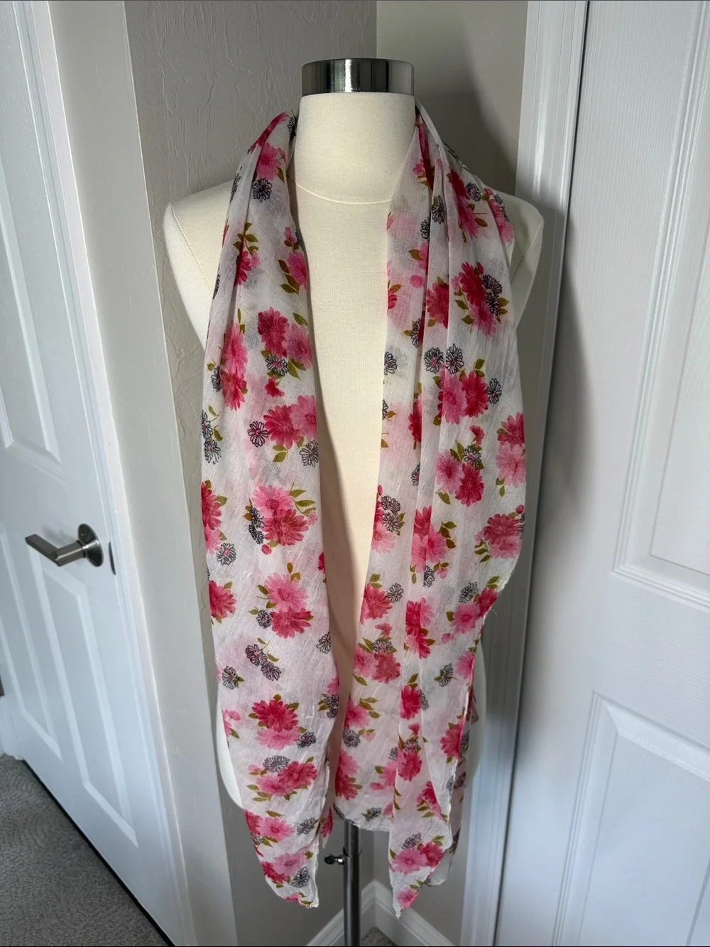 Red and pink daisy floral print scarf on gauzy sheer white background